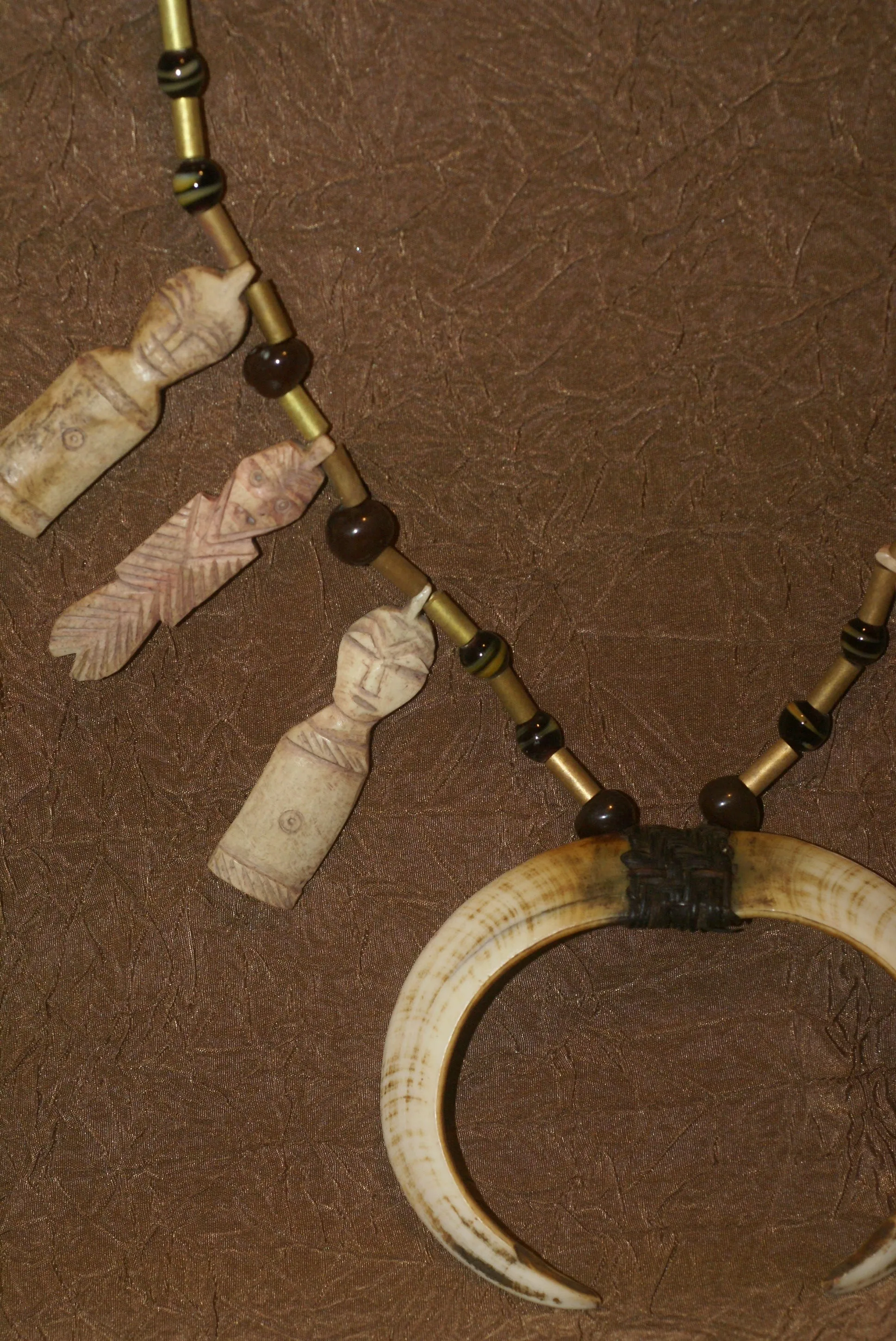 Unique “Big Man” Chief Tribal Boar Tusks & Ancestors’s Status Trophy,  Important Pectoral Ornament Worn during Initiations, also used as Currency, Bride Price, Feud Payments , collected in the late 1900’s in the Highlands Of Papua New Guinea