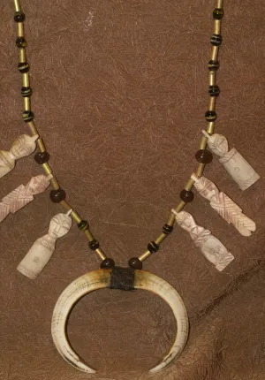 Unique “Big Man” Chief Tribal Boar Tusks & Ancestors’s Status Trophy,  Important Pectoral Ornament Worn during Initiations, also used as Currency, Bride Price, Feud Payments , collected in the late 1900’s in the Highlands Of Papua New Guinea
