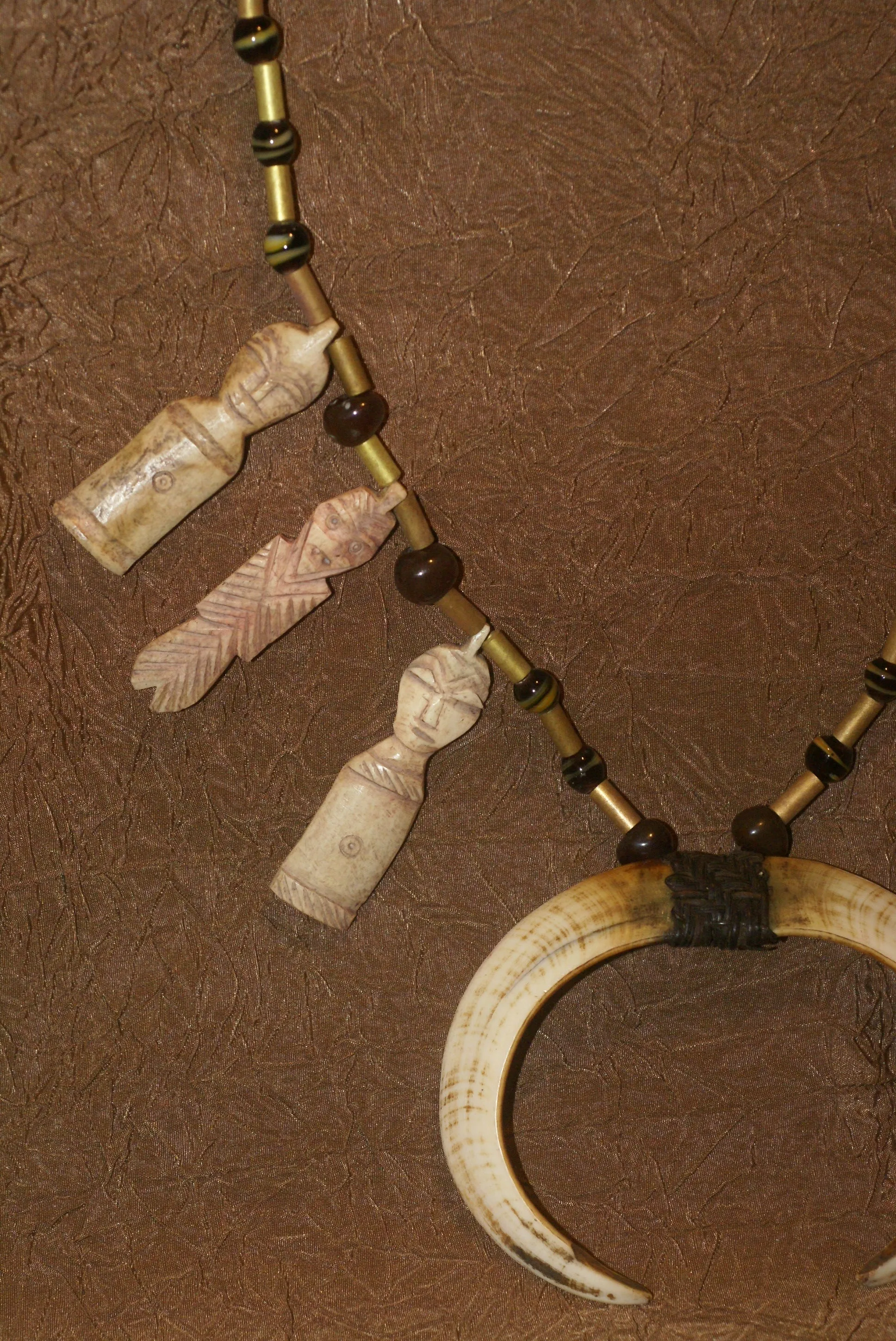 Unique “Big Man” Chief Tribal Boar Tusks & Ancestors’s Status Trophy,  Important Pectoral Ornament Worn during Initiations, also used as Currency, Bride Price, Feud Payments , collected in the late 1900’s in the Highlands Of Papua New Guinea