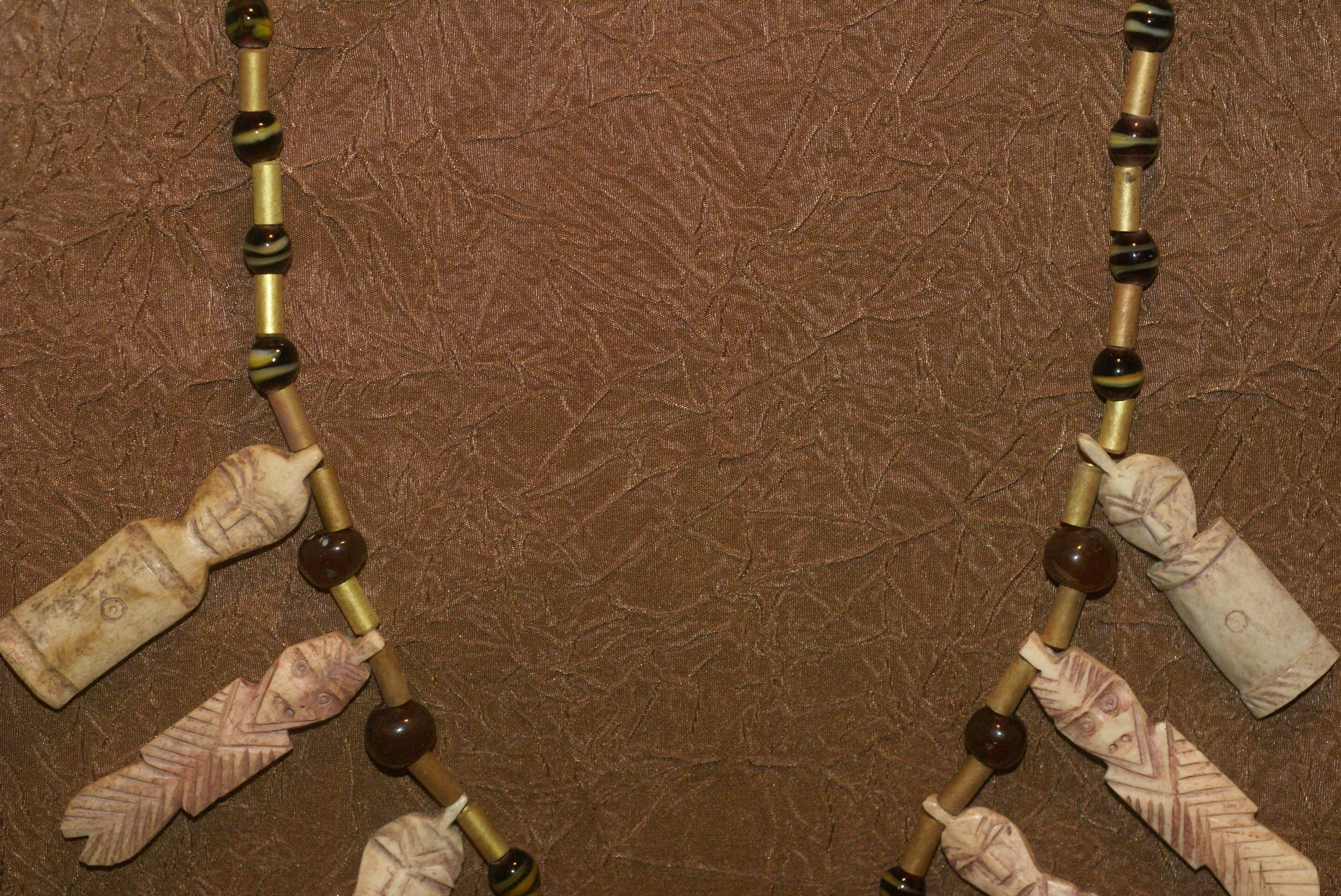 Unique “Big Man” Chief Tribal Boar Tusks & Ancestors’s Status Trophy,  Important Pectoral Ornament Worn during Initiations, also used as Currency, Bride Price, Feud Payments , collected in the late 1900’s in the Highlands Of Papua New Guinea