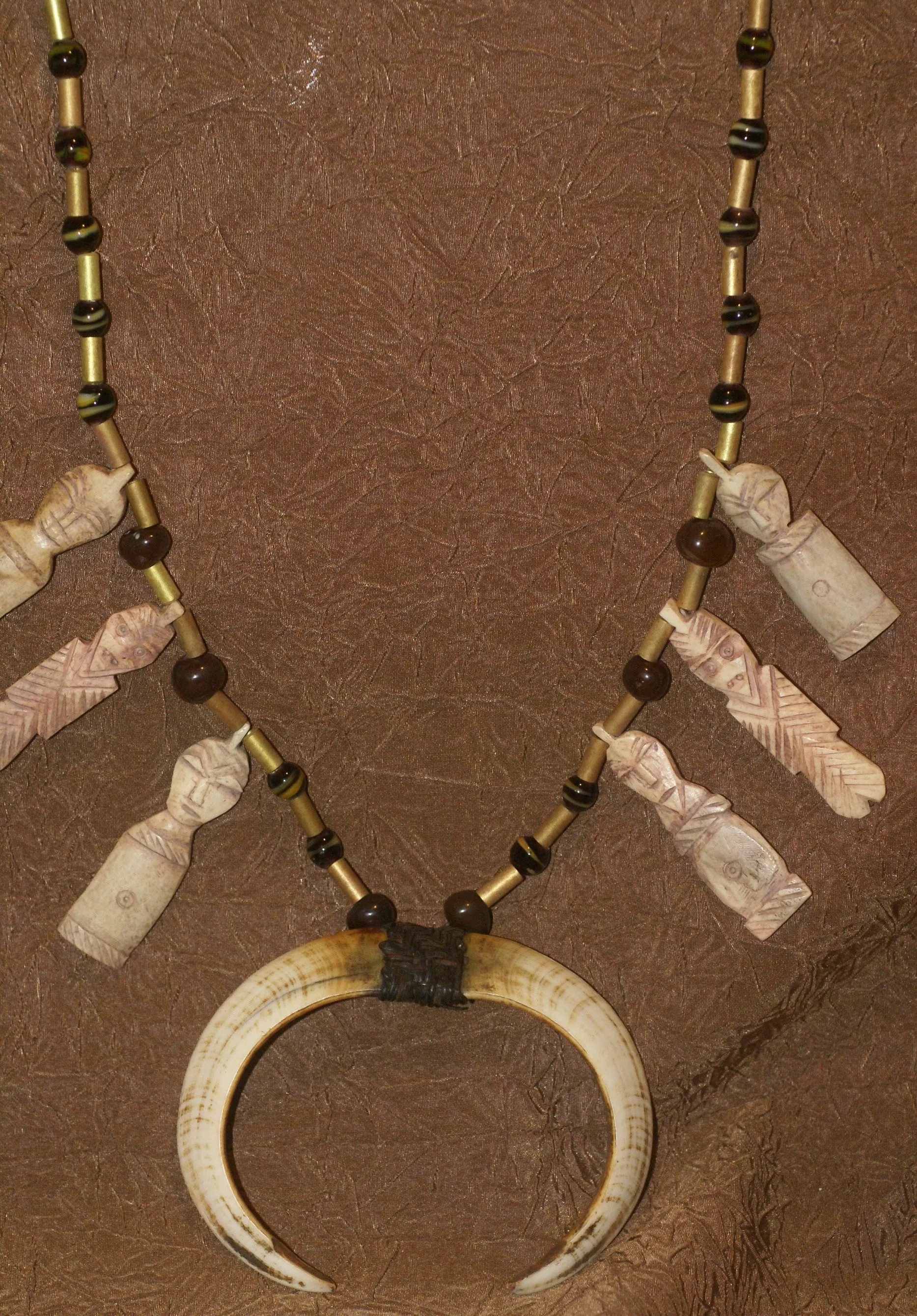 Unique “Big Man” Chief Tribal Boar Tusks & Ancestors’s Status Trophy,  Important Pectoral Ornament Worn during Initiations, also used as Currency, Bride Price, Feud Payments , collected in the late 1900’s in the Highlands Of Papua New Guinea