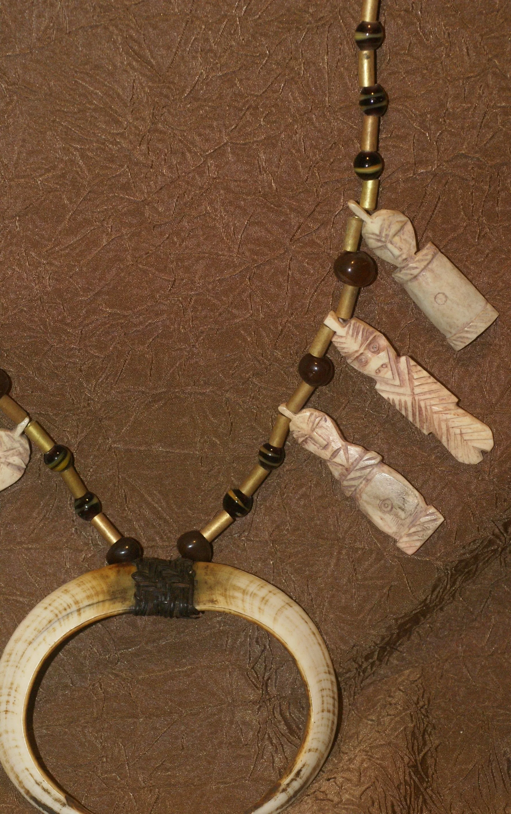 Unique “Big Man” Chief Tribal Boar Tusks & Ancestors’s Status Trophy,  Important Pectoral Ornament Worn during Initiations, also used as Currency, Bride Price, Feud Payments , collected in the late 1900’s in the Highlands Of Papua New Guinea