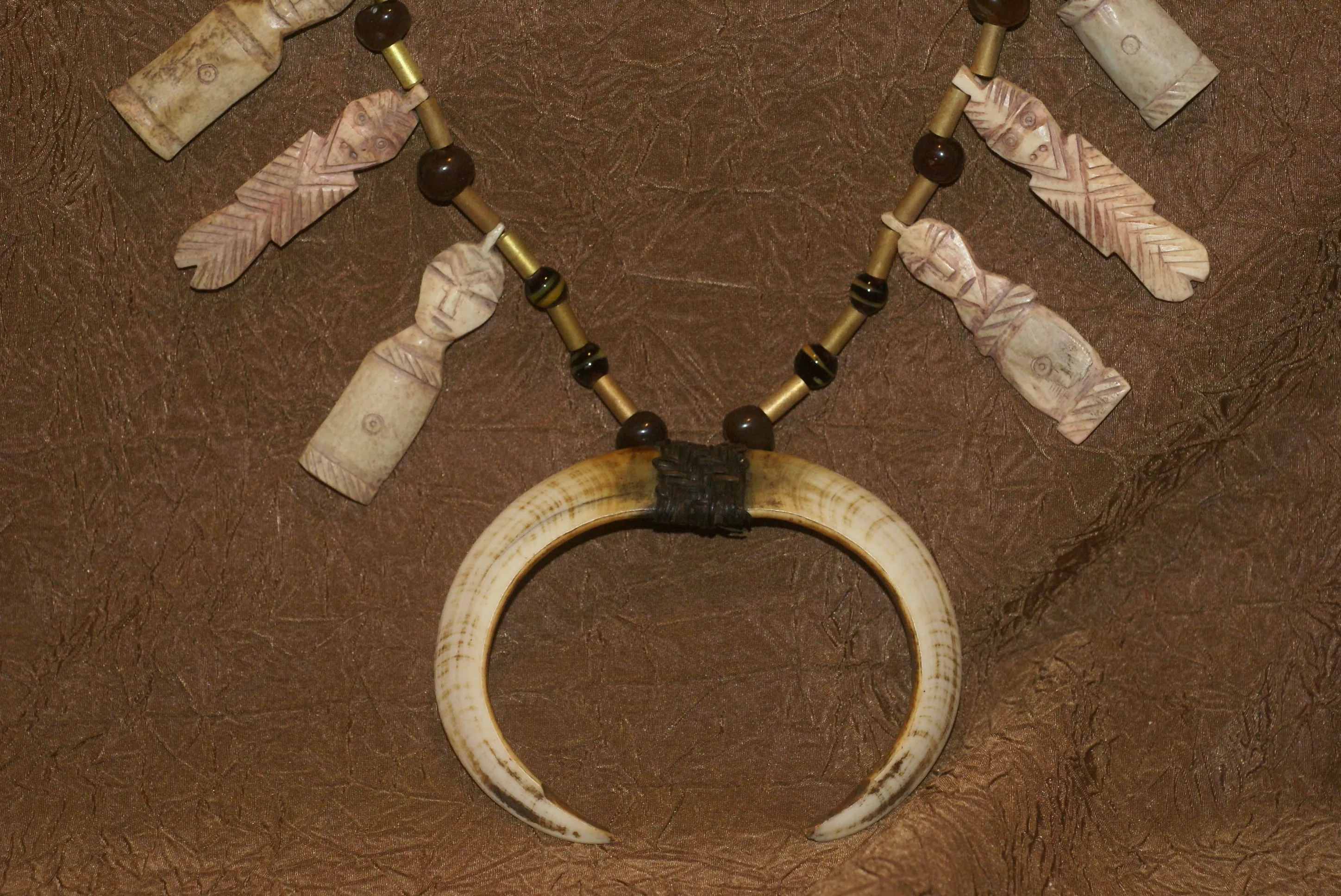 Unique “Big Man” Chief Tribal Boar Tusks & Ancestors’s Status Trophy,  Important Pectoral Ornament Worn during Initiations, also used as Currency, Bride Price, Feud Payments , collected in the late 1900’s in the Highlands Of Papua New Guinea