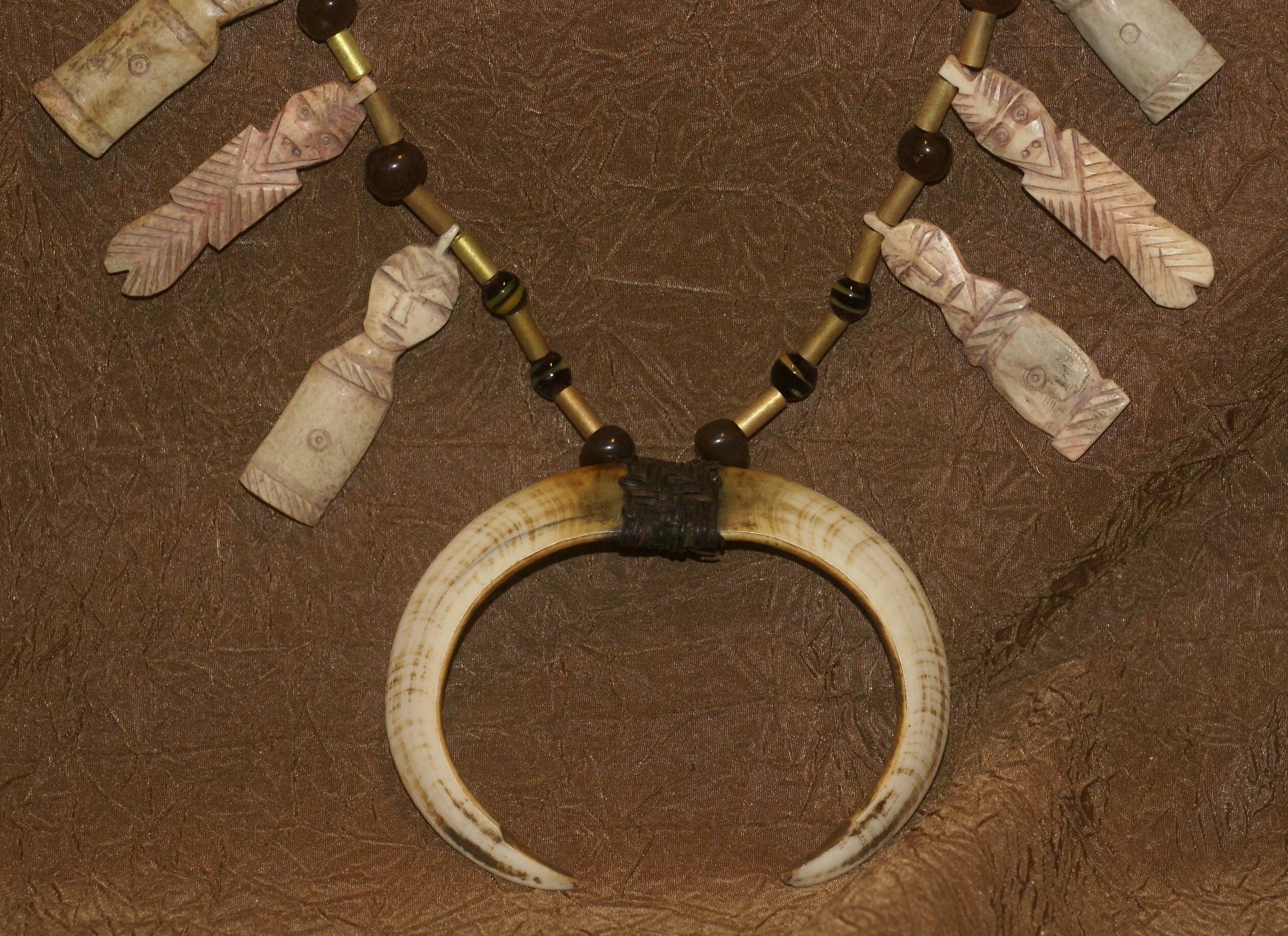 Unique “Big Man” Chief Tribal Boar Tusks & Ancestors’s Status Trophy,  Important Pectoral Ornament Worn during Initiations, also used as Currency, Bride Price, Feud Payments , collected in the late 1900’s in the Highlands Of Papua New Guinea