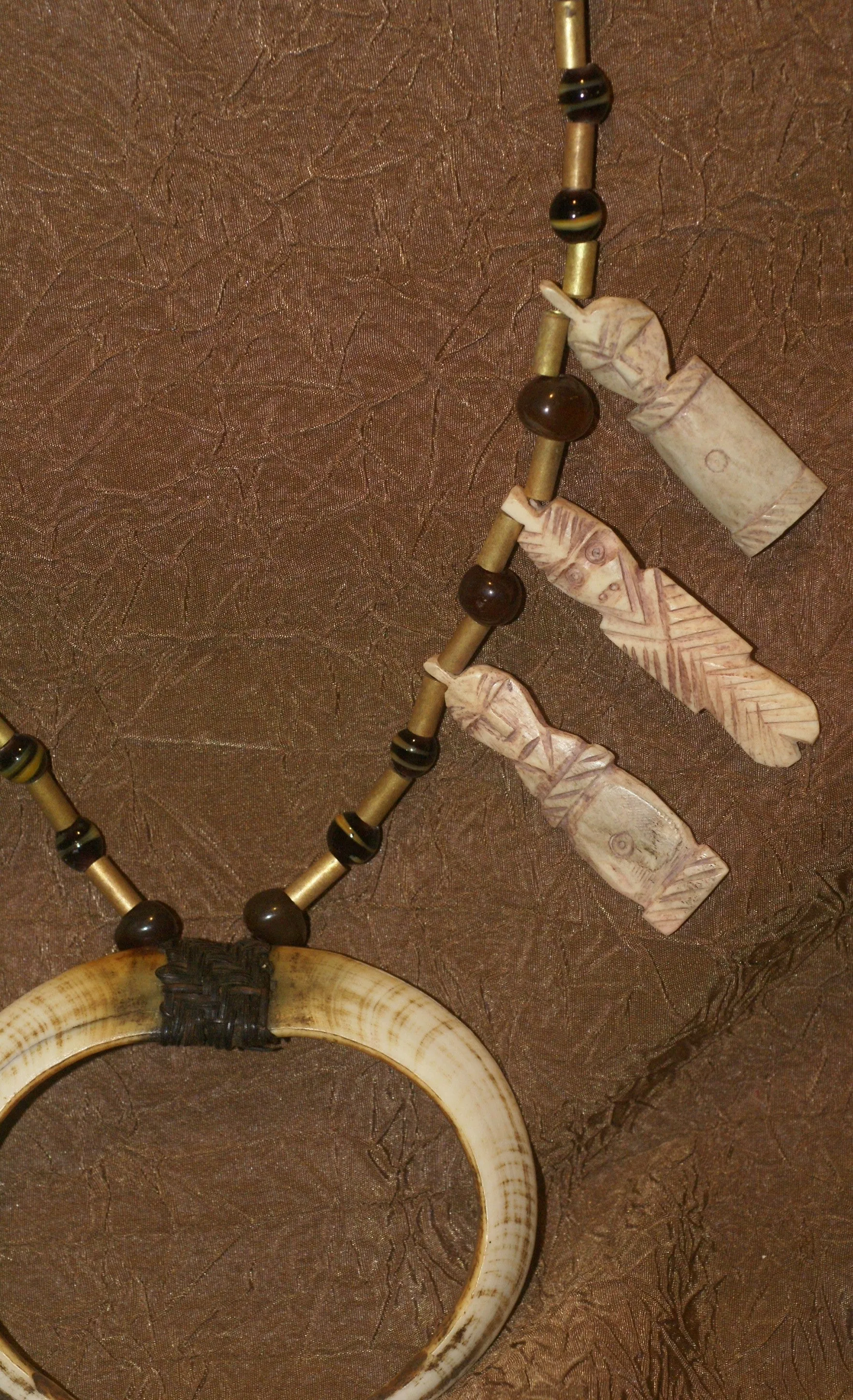 Unique “Big Man” Chief Tribal Boar Tusks & Ancestors’s Status Trophy,  Important Pectoral Ornament Worn during Initiations, also used as Currency, Bride Price, Feud Payments , collected in the late 1900’s in the Highlands Of Papua New Guinea