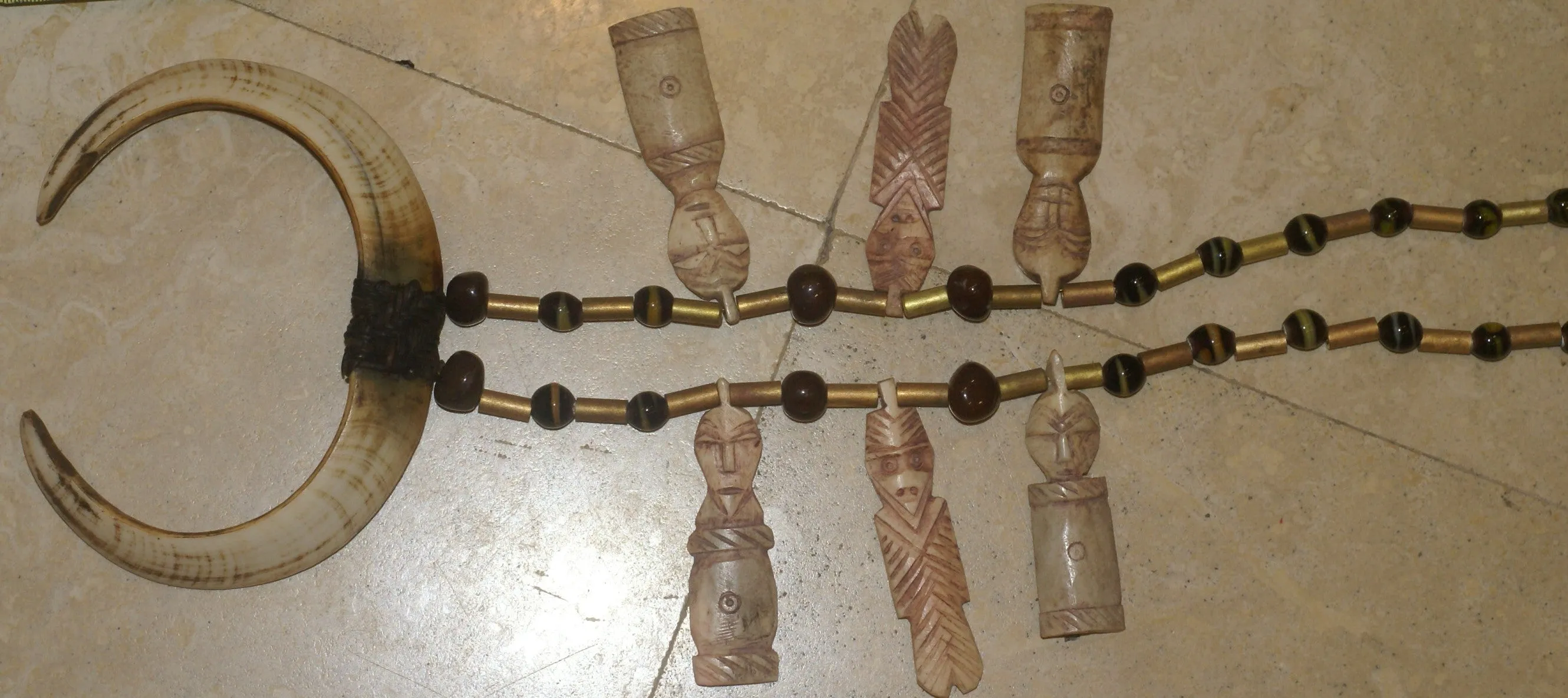 Unique “Big Man” Chief Tribal Boar Tusks & Ancestors’s Status Trophy,  Important Pectoral Ornament Worn during Initiations, also used as Currency, Bride Price, Feud Payments , collected in the late 1900’s in the Highlands Of Papua New Guinea