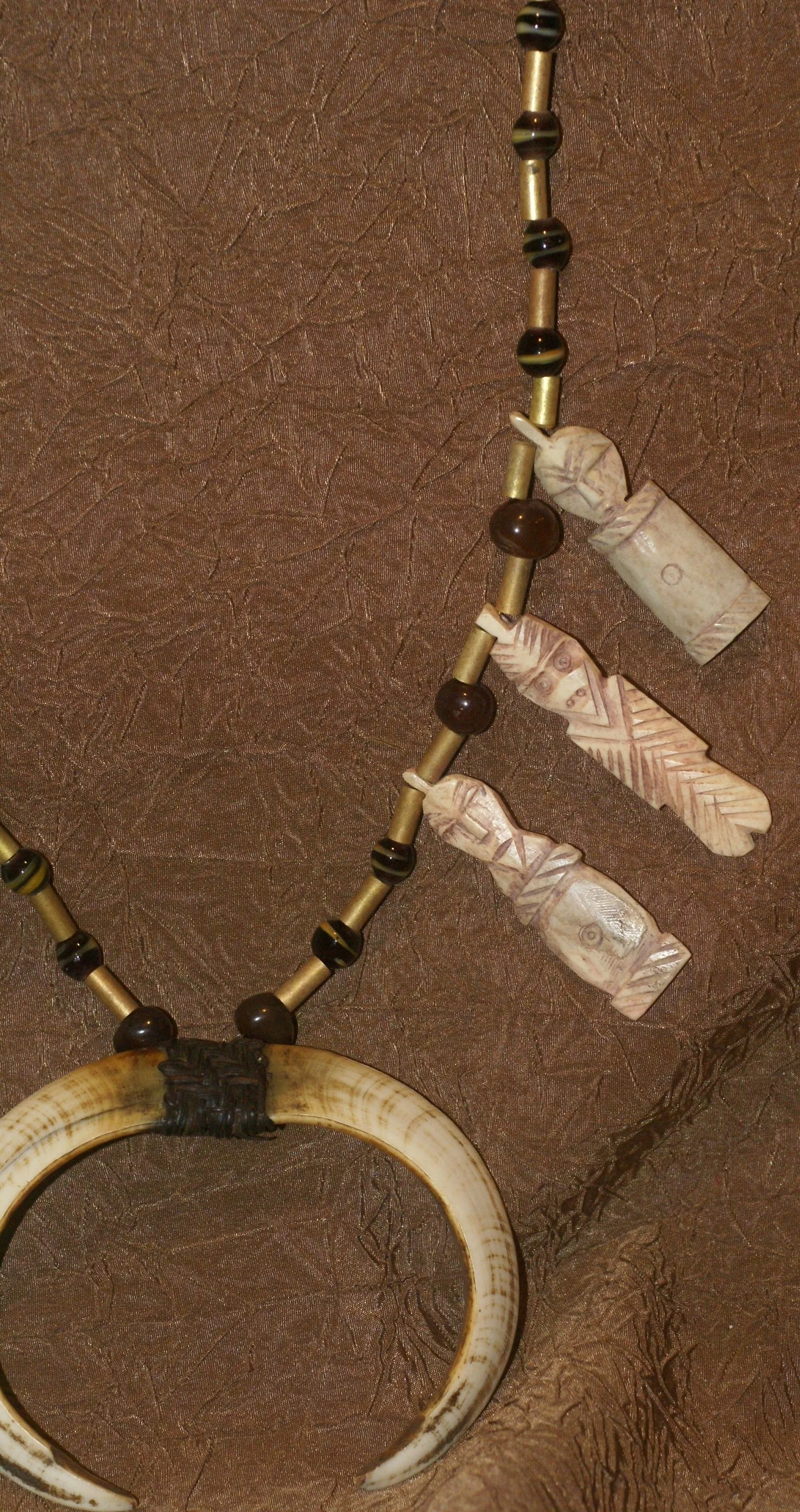 Unique “Big Man” Chief Tribal Boar Tusks & Ancestors’s Status Trophy,  Important Pectoral Ornament Worn during Initiations, also used as Currency, Bride Price, Feud Payments , collected in the late 1900’s in the Highlands Of Papua New Guinea