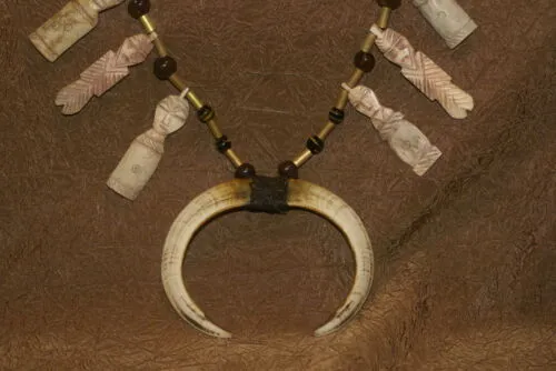 Unique “Big Man” Chief Tribal Boar Tusks & Ancestors’s Status Trophy,  Important Pectoral Ornament Worn during Initiations, also used as Currency, Bride Price, Feud Payments , collected in the late 1900’s in the Highlands Of Papua New Guinea