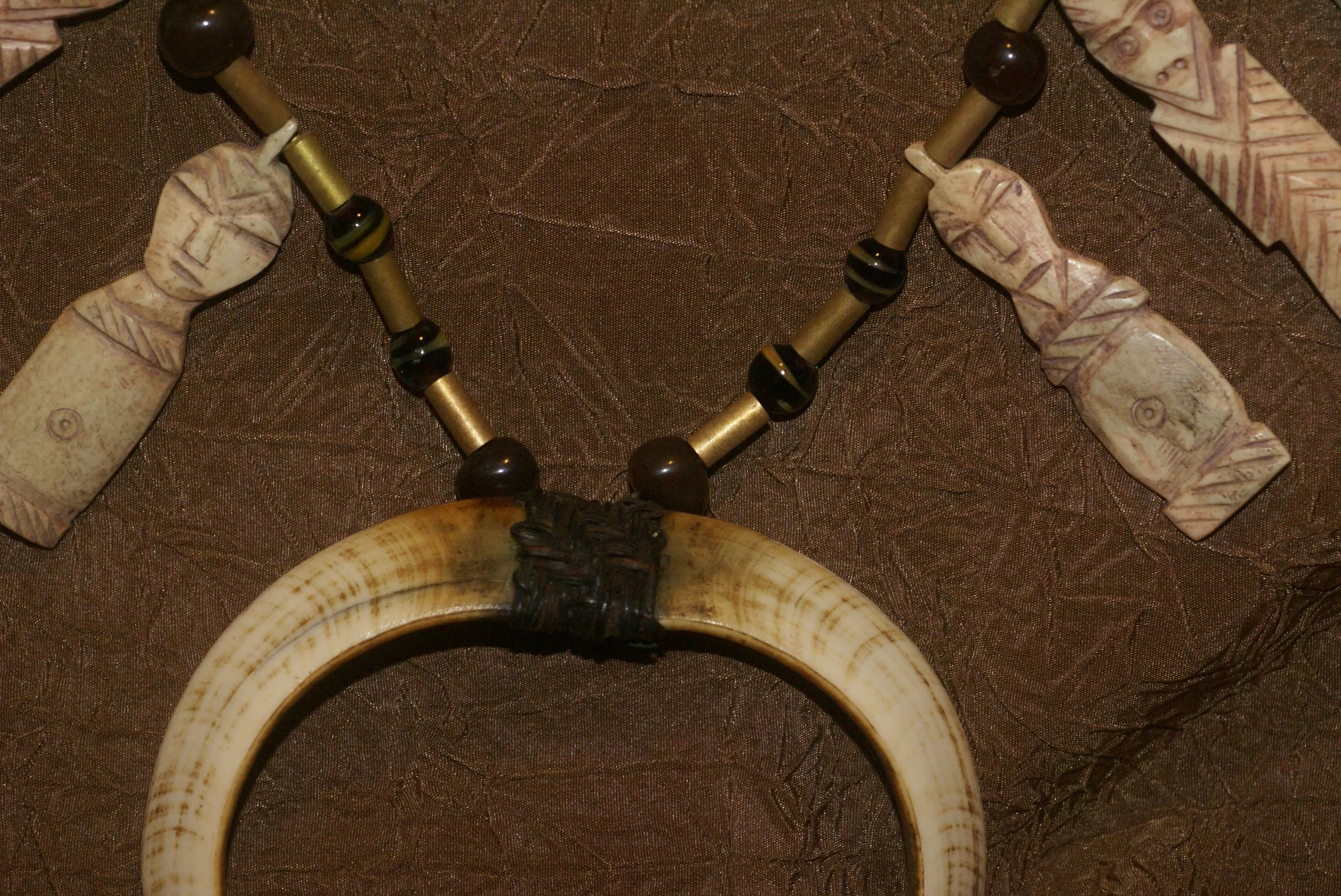 Unique “Big Man” Chief Tribal Boar Tusks & Ancestors’s Status Trophy,  Important Pectoral Ornament Worn during Initiations, also used as Currency, Bride Price, Feud Payments , collected in the late 1900’s in the Highlands Of Papua New Guinea