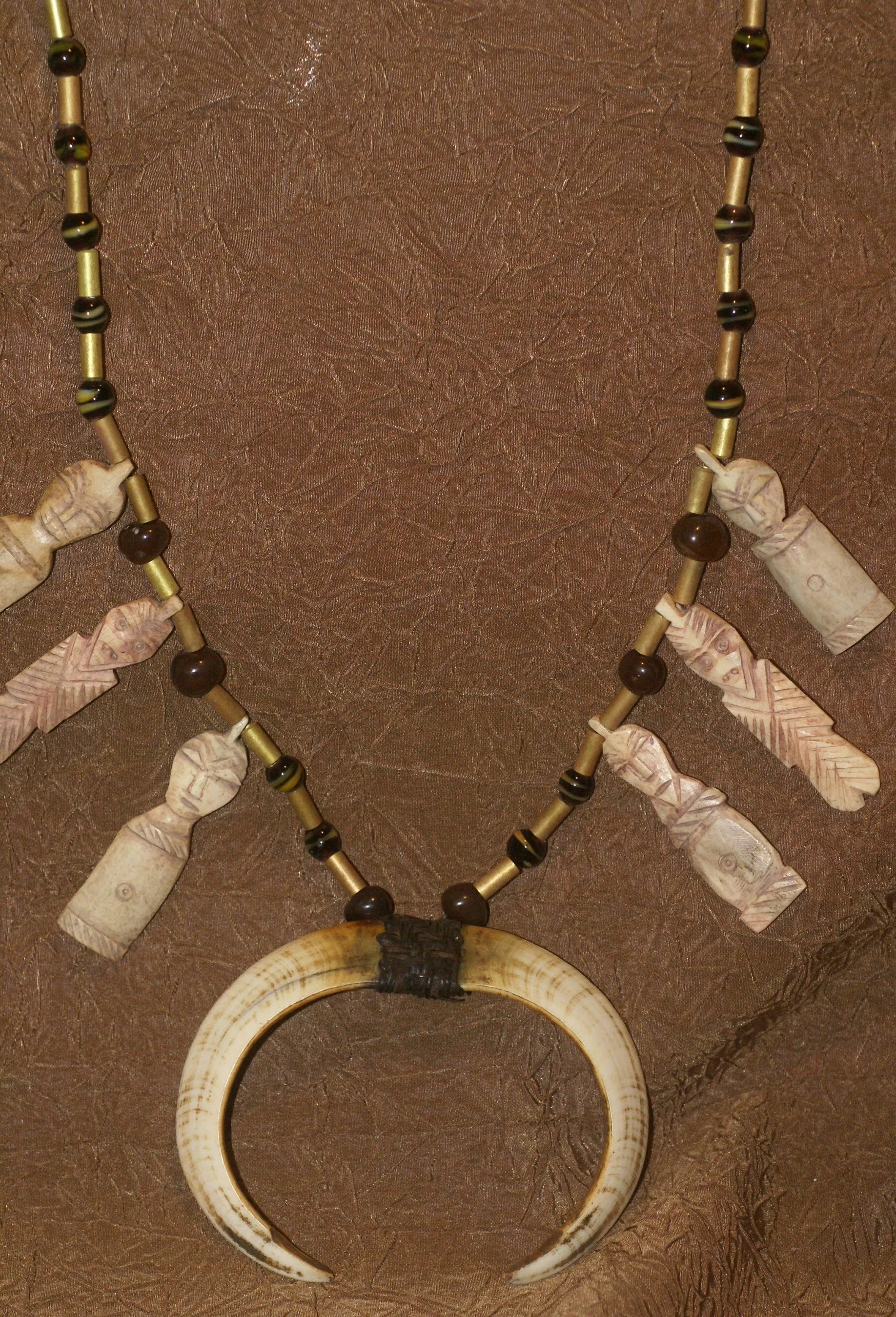 Unique “Big Man” Chief Tribal Boar Tusks & Ancestors’s Status Trophy,  Important Pectoral Ornament Worn during Initiations, also used as Currency, Bride Price, Feud Payments , collected in the late 1900’s in the Highlands Of Papua New Guinea