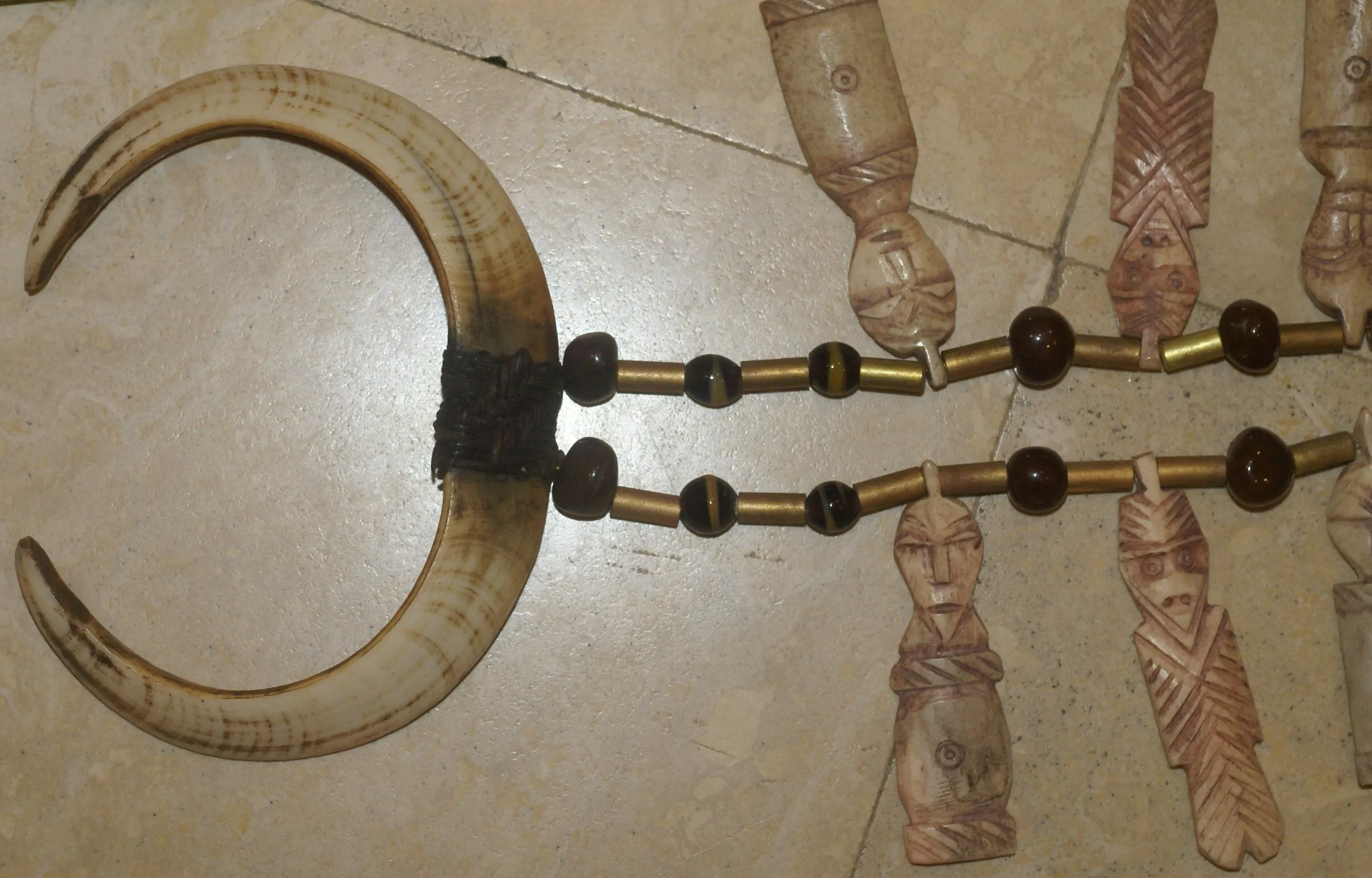 Unique “Big Man” Chief Tribal Boar Tusks & Ancestors’s Status Trophy,  Important Pectoral Ornament Worn during Initiations, also used as Currency, Bride Price, Feud Payments , collected in the late 1900’s in the Highlands Of Papua New Guinea